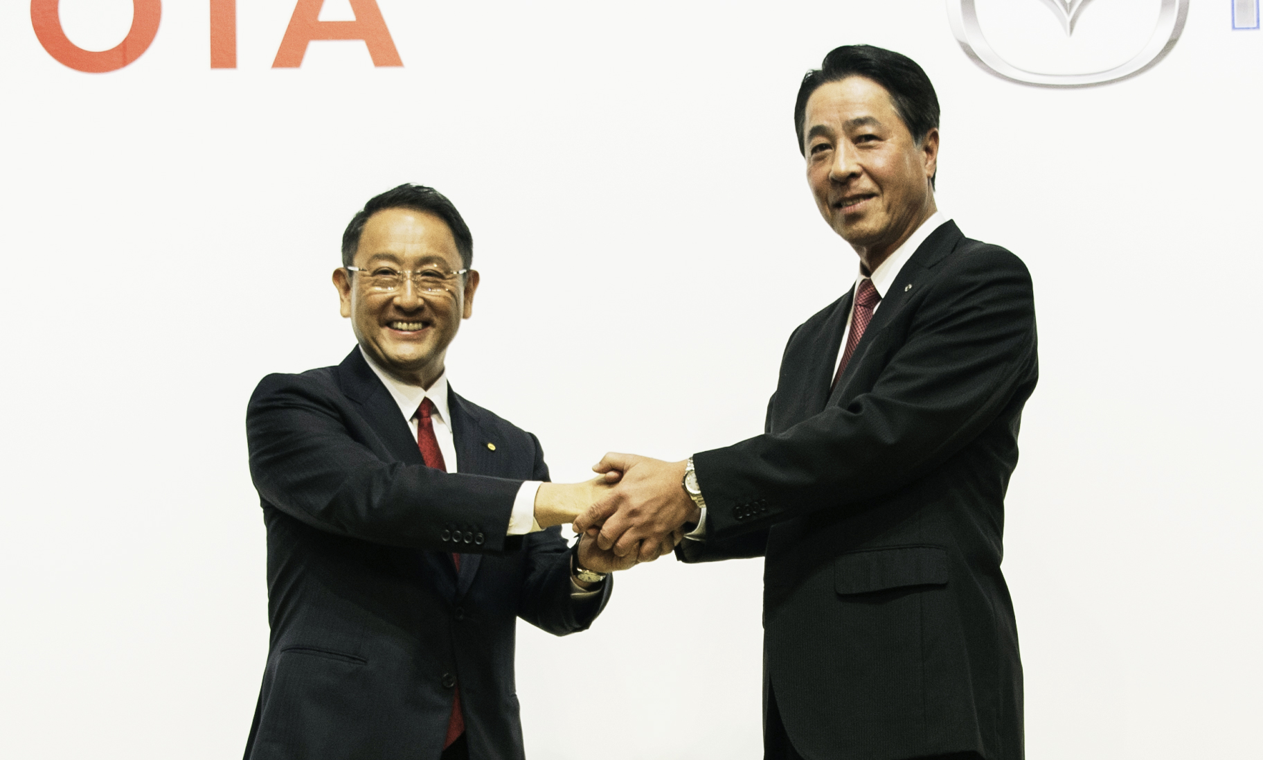 Left: Toyota President and CEO Akio Toyoda, right: Mazda President and CEO Masamichi Kogai