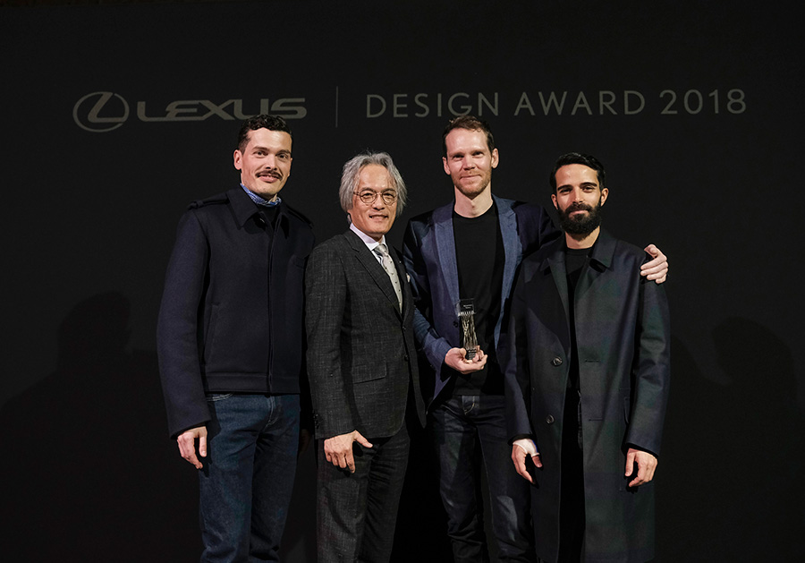 Lexus Design Award 2018 From left: Simone Farresin of Formafantasma (Mentor), Yoshihiro Sawa (President, Lexus International), Elliott P. Montgomery of Extrapolation Factory (Grand Prix Winner), Andrea Trimarchi of Formafantasma (Mentor)